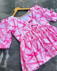 T002 Abstract Peplum top