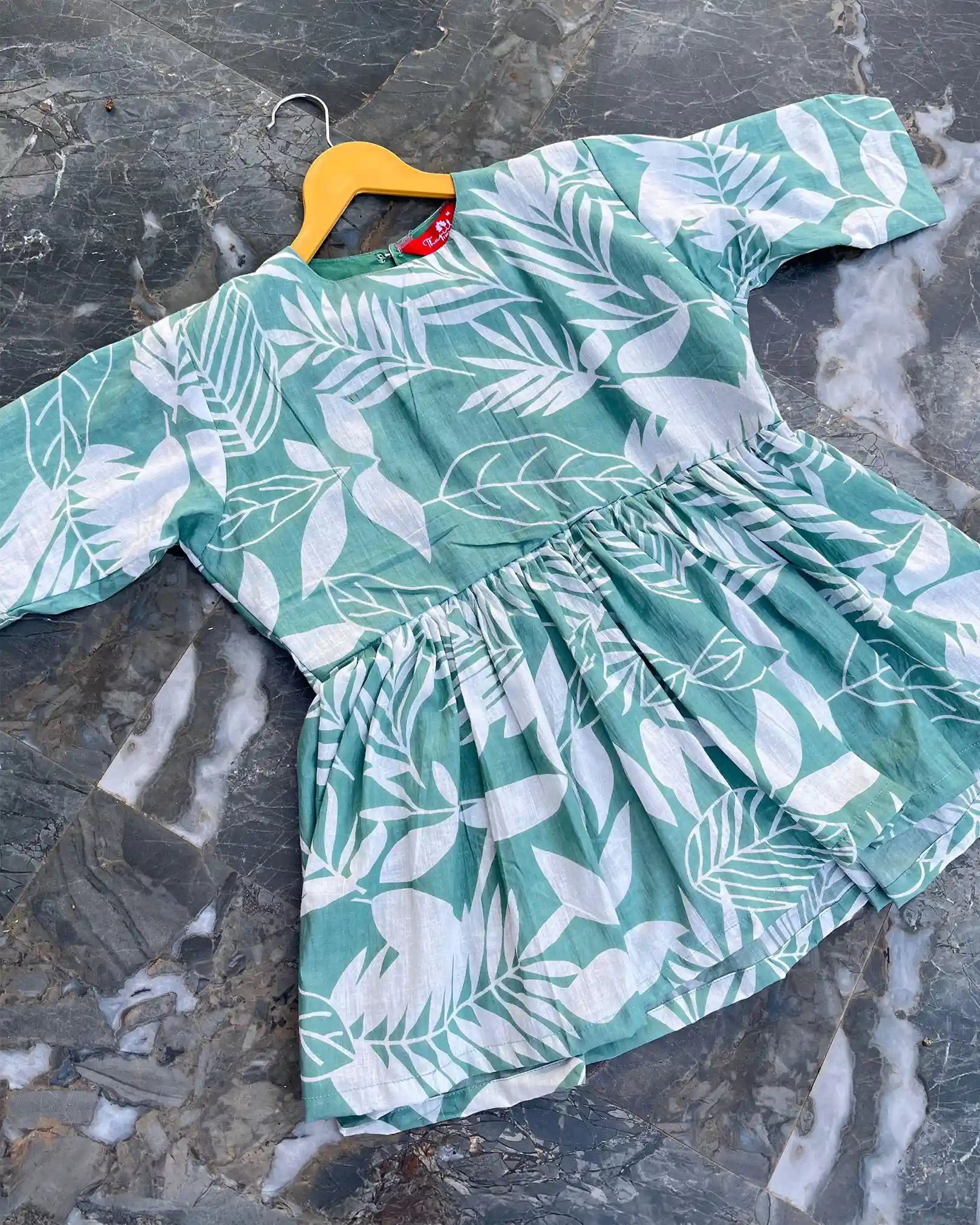 T028 Sea green cotton peplum top