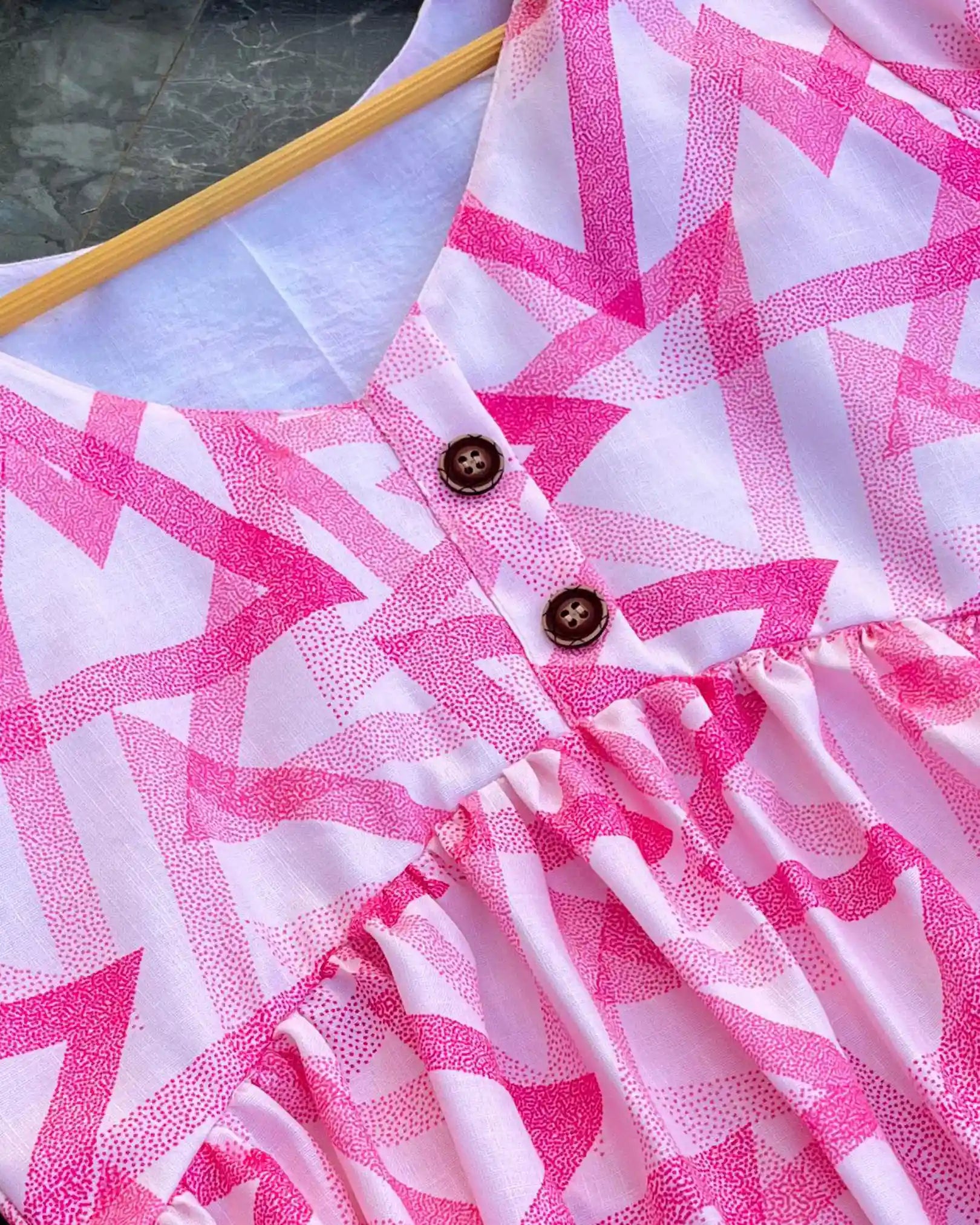 T002 Abstract Peplum top