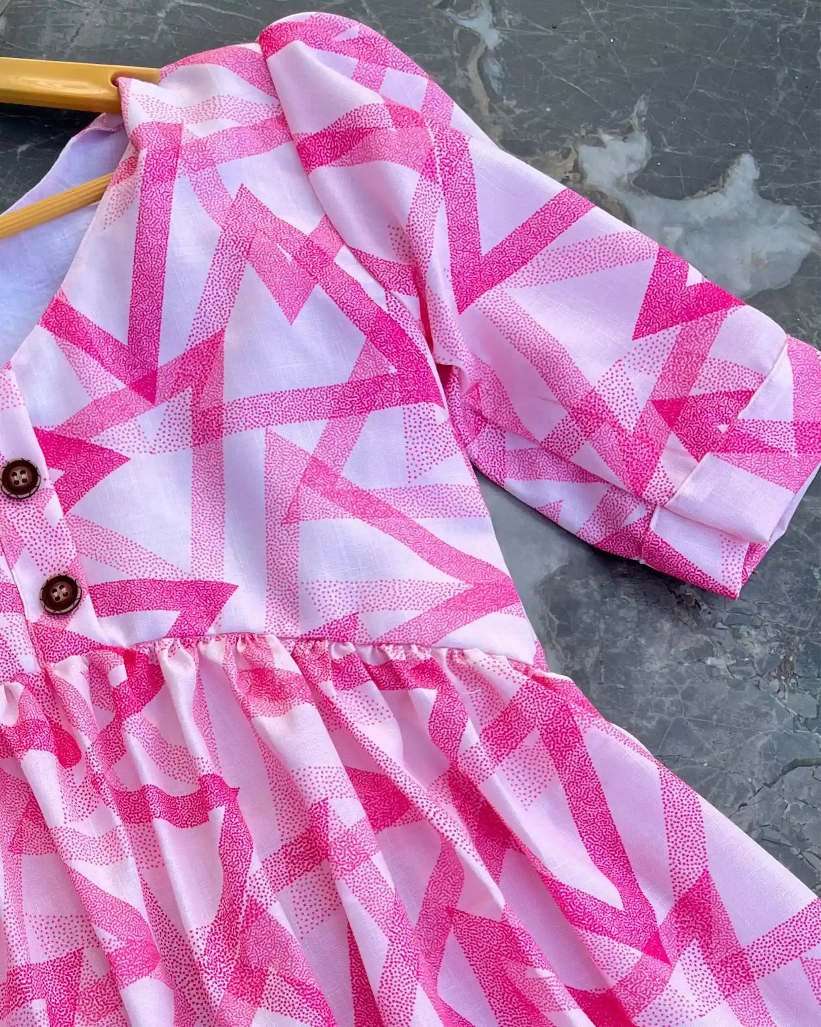 T002 Abstract Peplum top