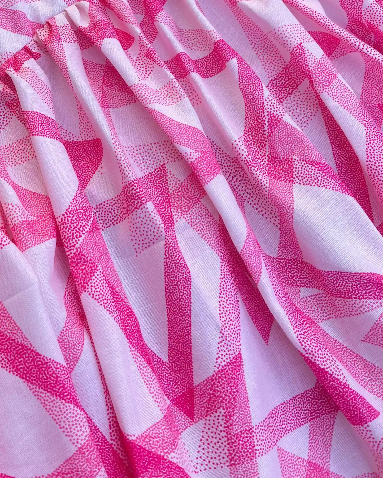 T002 Abstract Peplum top